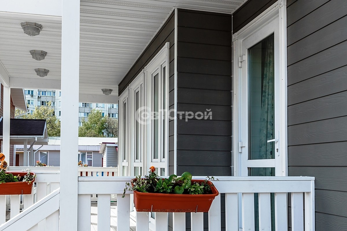 Дома отделанные фиброцементным сайдингом кедрал